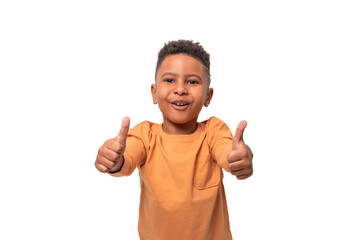little dark skinned African  boy  gesturing approval, isolated