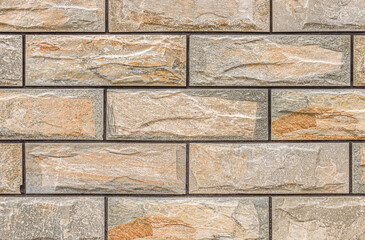 Wall from natural stone tiles. Stone texture.