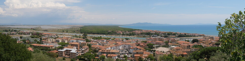 Fototapeta na wymiar Panorama of the modern part of Castiglione della Pescaia and of its coast lapped by the Tyrrhenian Sea.