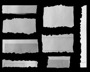 Torn papers on black