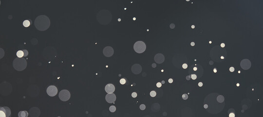 Abstract grey bokeh background. Background with white bokeh.