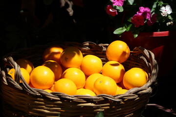 Basket with many oranges 