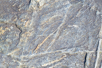 Line stone background. Dark grey and white granite untreated surface.