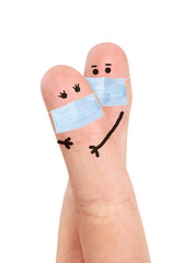 Painted happy fingers wearing surgical breathing mask