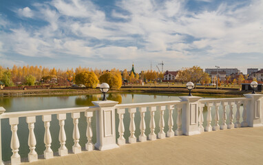 Terrace over the water in the autumn city park