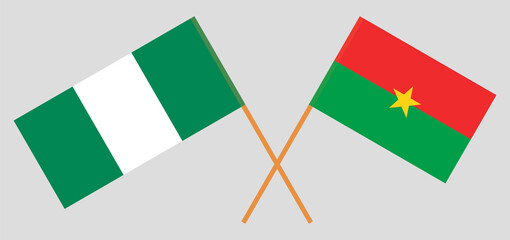 Crossed flags of Nigeria and Burkina Faso