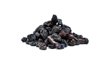a handful of small black raisins on a white background
