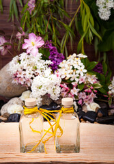 Aromatherapy, spa, beauty treatment and wellness background with massage stone, flowers, flacon.. spa concept