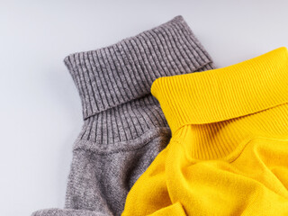 Fashion flat lay gray yellow turtle neck match. Lady fashion winter autumn cozy flat lay in trendy colors.