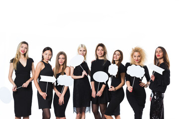 Fototapeta na wymiar Group of young beautiful women in black dress isolated on white background.