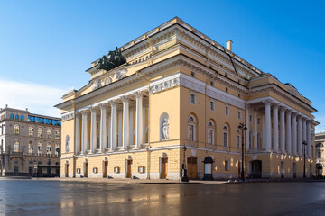 Fototapeta na wymiar Theater in Saint Petersburg. Russia town. Theater building in center of Saint Petersburg. Sights of Petersburg. Architecture of Russian cities. Exterior of Russian buildings. Russia in sunny weather