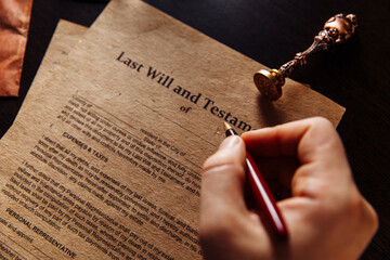 Notary public in office signing documents. Close-up.