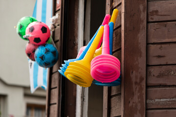 Sink cleaners for kitchen on the wooden wall. Kitchen bathroom sink plunger.