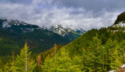 Mountain landscape. Snow in the mountains at the end of winter, snow melting in the mountains.