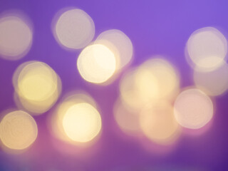 Soft, large, colorful bokeh different colors on a pink background