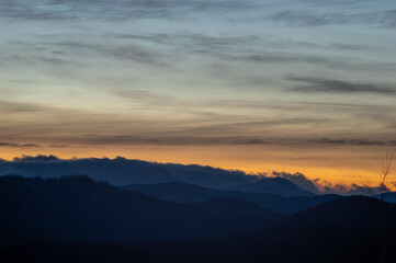 Colorful sky at sunset in the mountains