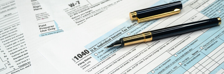 USA tax form 1040 for US individual tax return. Close-up and wide banner