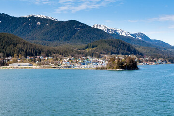 Fototapeta premium View of Juneau, the capital city of Alaska, with surrounding mountains and forests