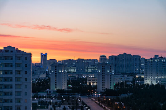 early morning in the city. Dawn in the city. The buildings are lined with white marble. Ashgabat, Turkmenistan.