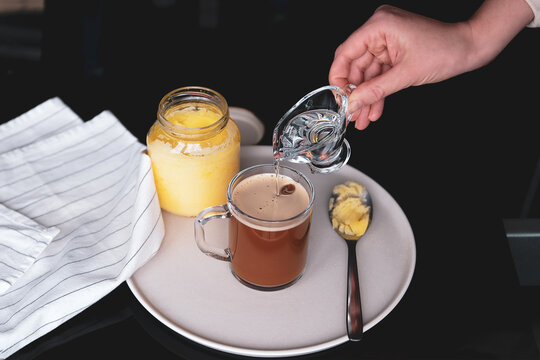 Bulletproof coffee, keto breakfast made with butter and MCT oil