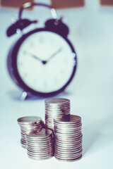 Gold coins stacks is representing riches and wealth management. Coin stack growing and find out the way to get a return on investment. Finance and money exchange investment as concept.