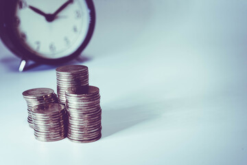 Gold coins stacks is representing riches and wealth management. Coin stack growing and find out the way to get a return on investment. Finance and money exchange investment as concept.