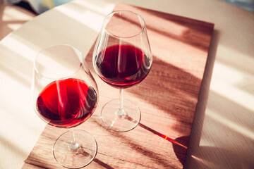 red French wine in a glass on the table