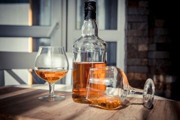 vintage cognac on the table with glasses