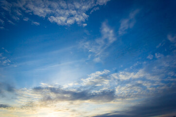 Blue sky and clouds at sunset. Background sky. Nature
