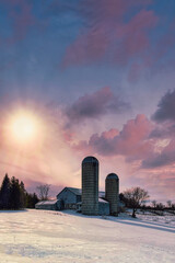 Rural winter scenes of large open fields and sky with barns, farmland and the setting sun.  Ice and cascades.  