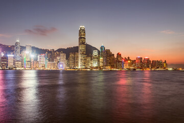 Fototapeta na wymiar View of Hong Kong harbour at sunset time.