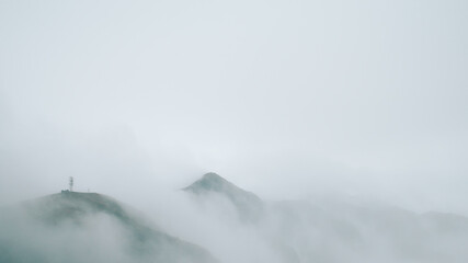 Fototapeta na wymiar Mountain ridge covered in fog on top of Wugong Mountain in Jiangxi, China