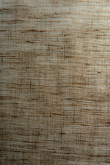 abstract rough colored linen natural fabric background, toning, short focus