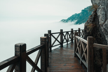 Wooden gallery road by cliff on top of Wugong Mountain in Jiangxi, China