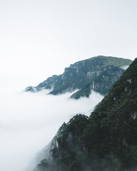 Fototapeta na wymiar Mountain covered by clouds on top of Wugong Mountain in Jiangxi, China