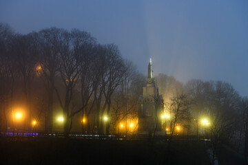 Foggy view of the monument to Volodymyr the Holy in Kyiv, Ukraine. December 2020