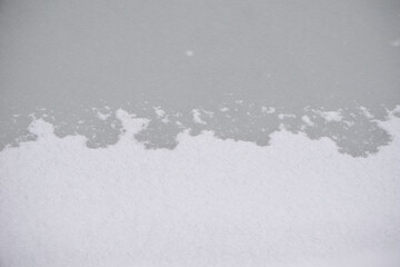 Fototapeta premium Snow Ice Gradient. Edge of a pond.