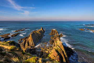 sunset on the coast
Scenic view of Barca Grande Beach the coastline near Almograve, at the Vicentine Coast, in Alentejo, Portugal. 