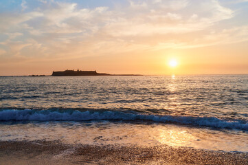 Fototapeta premium Moledo beach sunset with ins fort and Trega mount