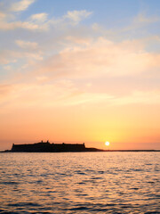 Moledo beach sunset with ins fort and Trega mount