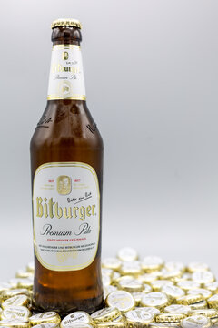 Beer bottle and caps from brewing company Bitburger, on January 28th, 2021 in Bad Homburg, Germany, with copy space