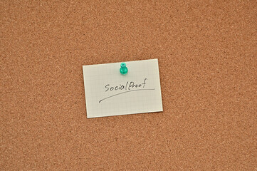 A piece of paper labeled Social proof is pinned to the corkboard.