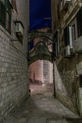 Fototapeta na wymiar Evening view of an alley in Kotor, Montenegro.