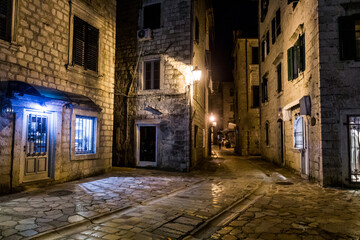 Fototapeta na wymiar Evening view of an alley in Kotor, Montenegro.