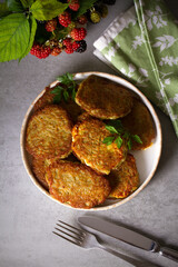 Potato Cakes. Vegetable fritters, latkes, hash browns. Vegetable pancakes. Overhead view