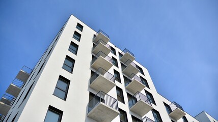 Modern apartment building in sunny day. Exterior, residential house facade.
