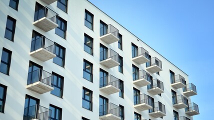 Fototapeta premium Modern apartment building in sunny day. Exterior, residential house facade.