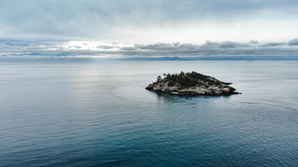 A aerial drone shot beautiful coastline with turquoise water on Vancouver Island. 4K 24FPS.