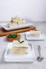 Nagasari loyang or cake pan nagasari, Indonesian traditional steamed snack made from rice flour, coconut milk, banana and served slices.