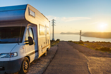 Caravan on coast at sunset, Spain